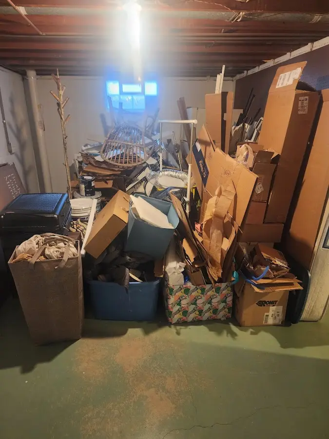 Roll-off dumpster container at job site for Construction Dumpster Rental in Clarkdale